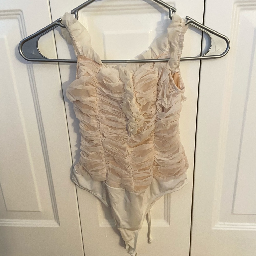 Bodysuit with ruffles